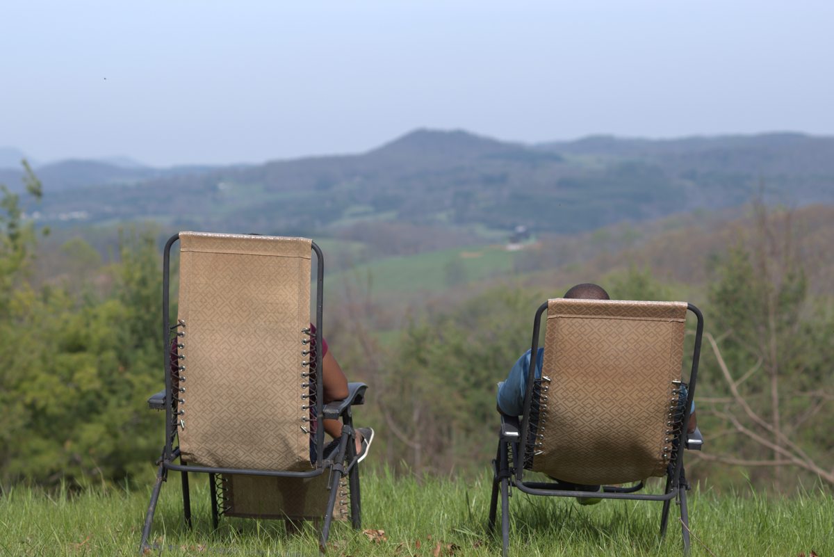 Two chairs overlooking Blue Ridge Mountains at Goodwins Peak